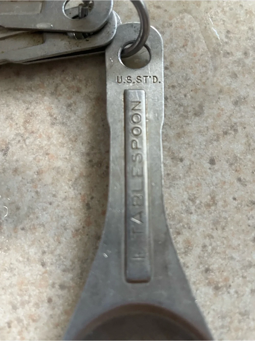 Vintage U.S.ST'D Aluminum Metal Measuring Spoons Oval Nesting Set of 4 on Ring
